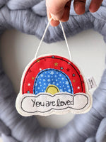 'You are loved' hanging rainbow decoration